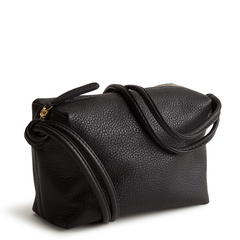 A leather crossbody purse in the color black, designed by Vera Bradley from the Vera Bradley New Day launch. This crossbody is shown in the Vera Bradley pattern Moonless Night.