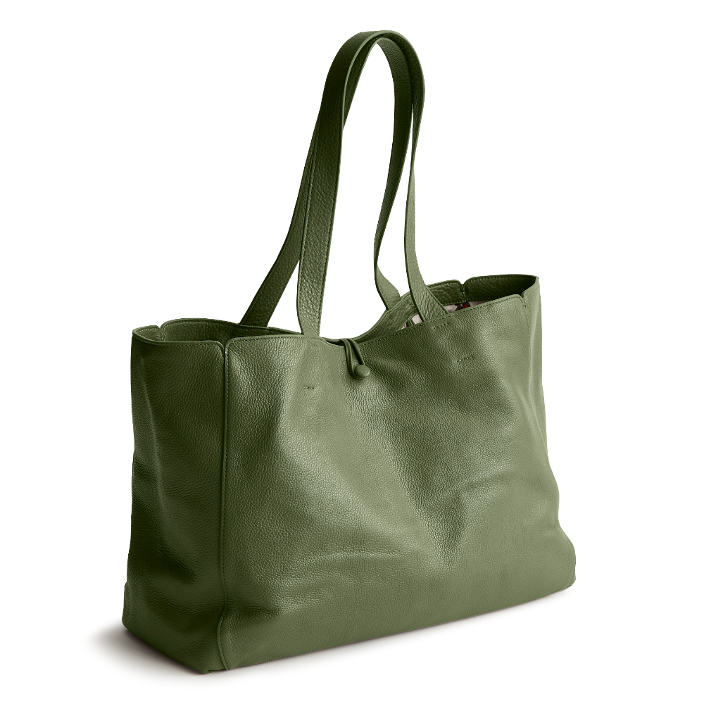 A green color tote bag from Vera Bradley New Day launch. The tote bag is made out of leather, and is shown in the Vera Bradley Pattern Bronze Green.