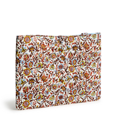 A white laptop insert showing a flower fabric, designed by Vera Bradley. This laptop insert is shown in the Vera Bradley Pattern, Marrakesh Vines Cream.