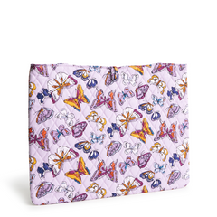 A pink laptop insert showing butterflies, designed by Vera Bradley. This laptop insert is shown in the Vera Bradley Pattern, Wing To Flight.