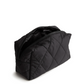 A black cosmetic bag from Vera Bradley in nylon fabric. Shown in the pattern: Moonless Night.