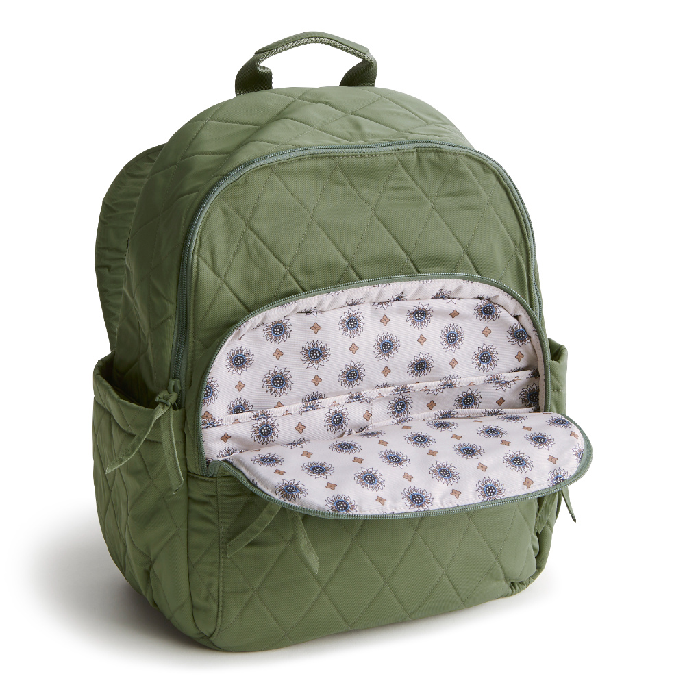 A green color Bancroft Backpack from Vera Bradley New Day. The backpack is designed from Polyester Twill. This bag is shown in pattern Bronze Green.