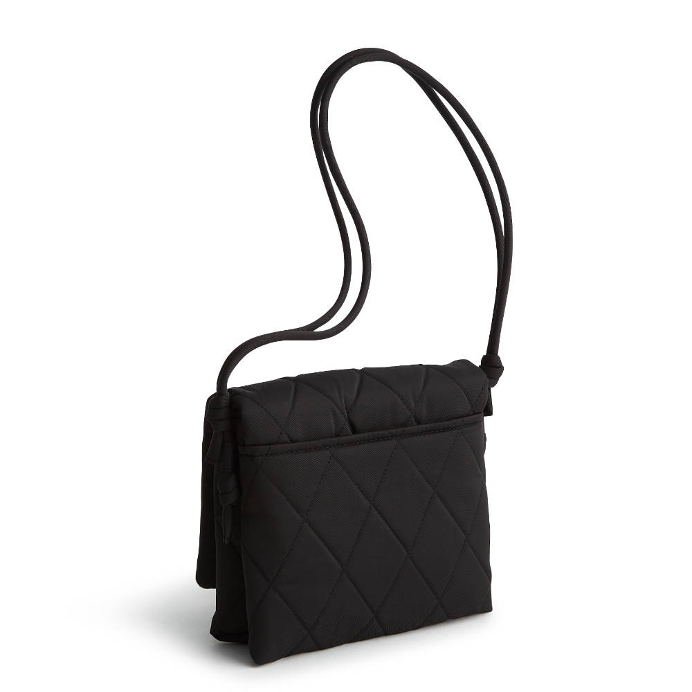 A green color hipster bag from Vera Bradley New Day, in the pattern Moonless Night.