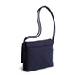 A green color hipster bag from Vera Bradley New Day, in the pattern Peacoat.