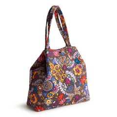 An original tote bag from Vera Bradley designed out of cotton gabardine. Shown in the pattern, Colorful Bouquet.