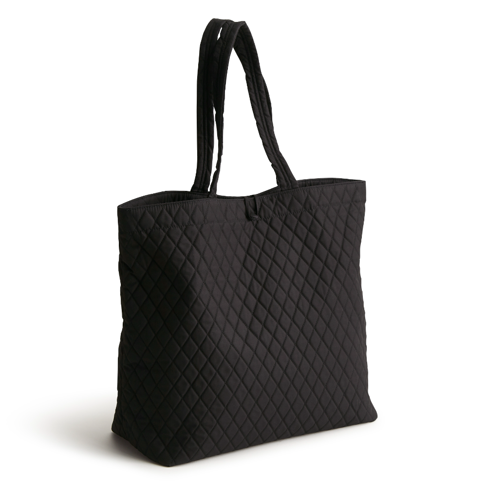 An original tote bag from Vera Bradley designed out of cotton gabardine. Shown in the pattern, Moonless Night.