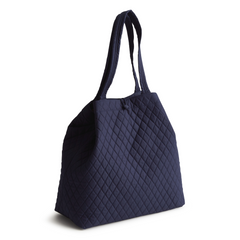 An original tote bag from Vera Bradley designed out of cotton gabardine. Shown in the pattern, Peacoat.