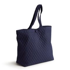 An original tote bag from Vera Bradley designed out of cotton gabardine. Shown in the pattern, Peacoat.