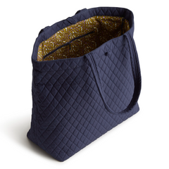 An original tote bag from Vera Bradley designed out of cotton gabardine. Shown in the pattern, Peacoat.