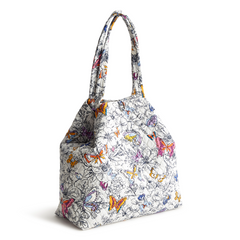 An original tote bag from Vera Bradley designed out of cotton gabardine. Shown in the pattern, Wing + Bloom.