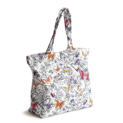 An original tote bag from Vera Bradley designed out of cotton gabardine. Shown in the pattern, Wing + Bloom.