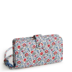 A phone wristlet case made from cotton gabardine, shown in the Vera Bradley pattern Bias Mini Vines Ribbons.