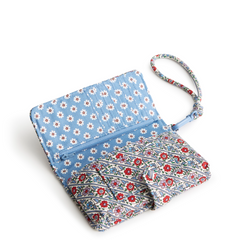 A phone wristlet case made from cotton gabardine, shown in the Vera Bradley pattern Bias Mini Vines Ribbons.