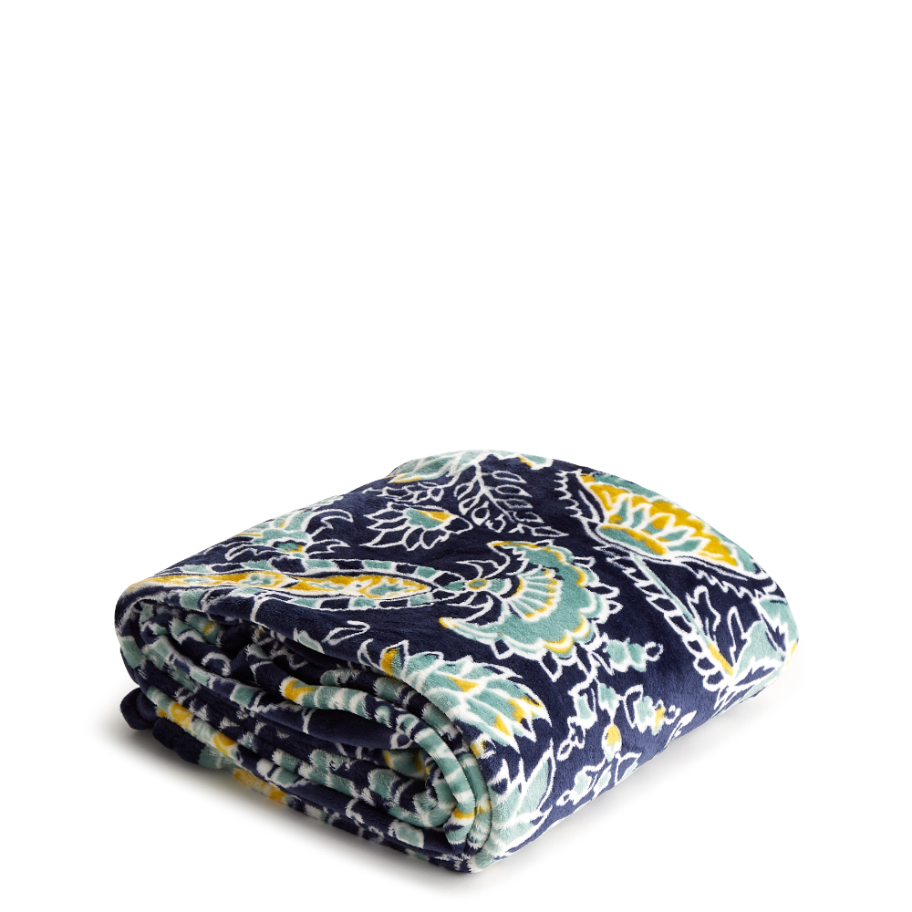 A plush throw blanket from Vera Bradley in Gemstone Paisley Aqua.