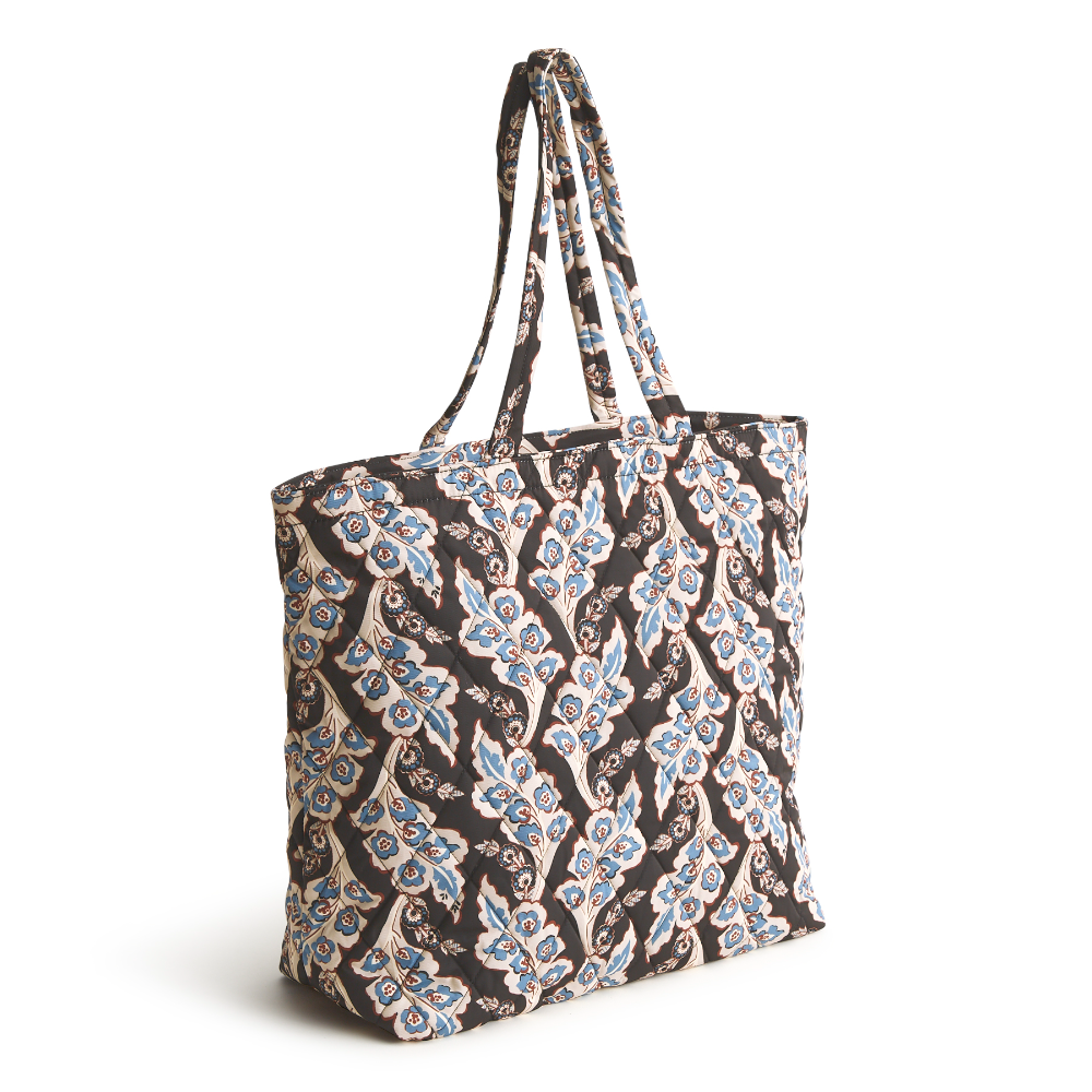 An original tote bag from Vera Bradley, made from polyester twill fabric. Shown in the pattern Calyx + Quill Black.