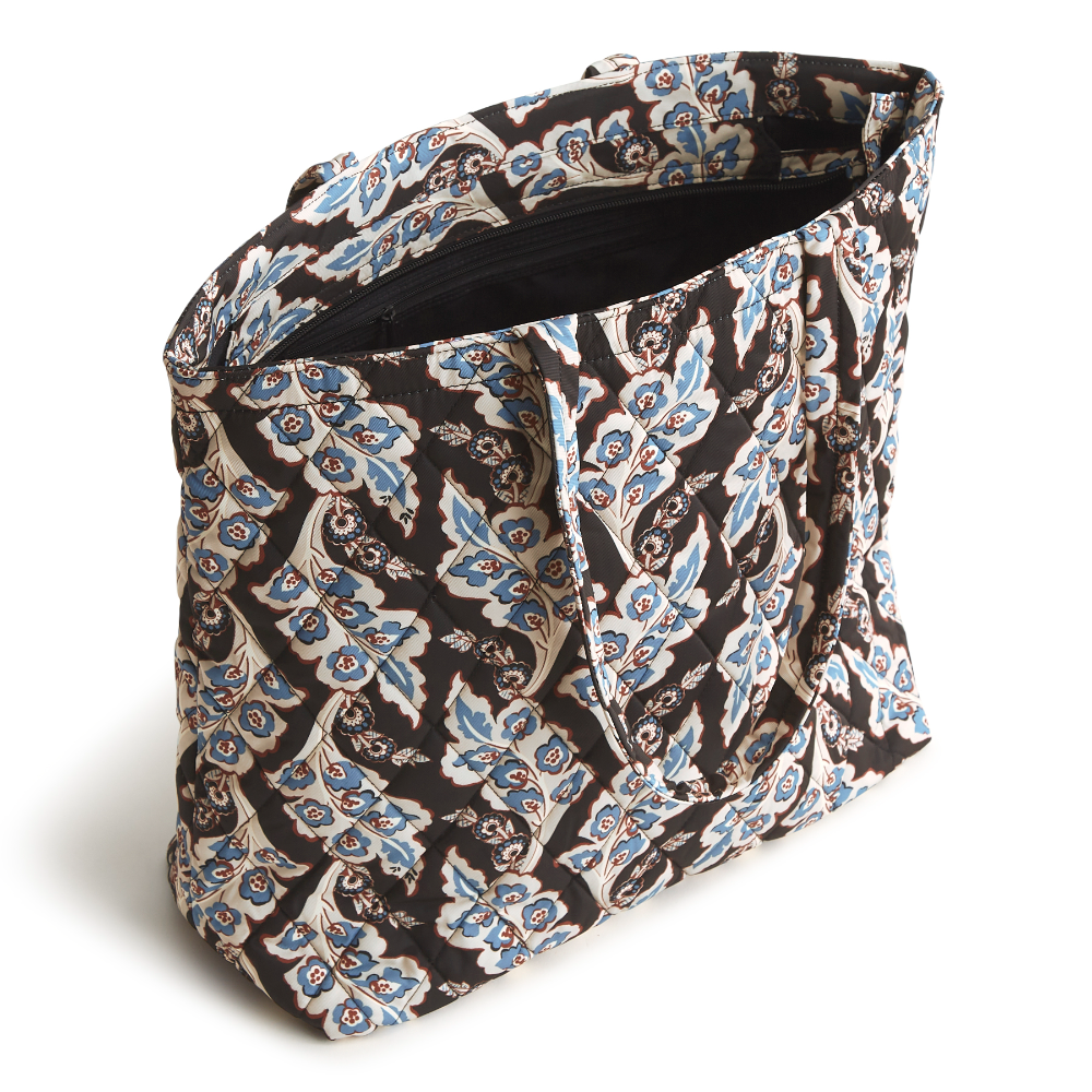 An original tote bag from Vera Bradley, made from polyester twill fabric. Shown in the pattern Calyx + Quill Black.