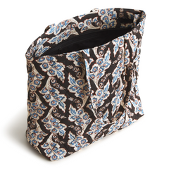 An original tote bag from Vera Bradley, made from polyester twill fabric. Shown in the pattern Calyx + Quill Black.