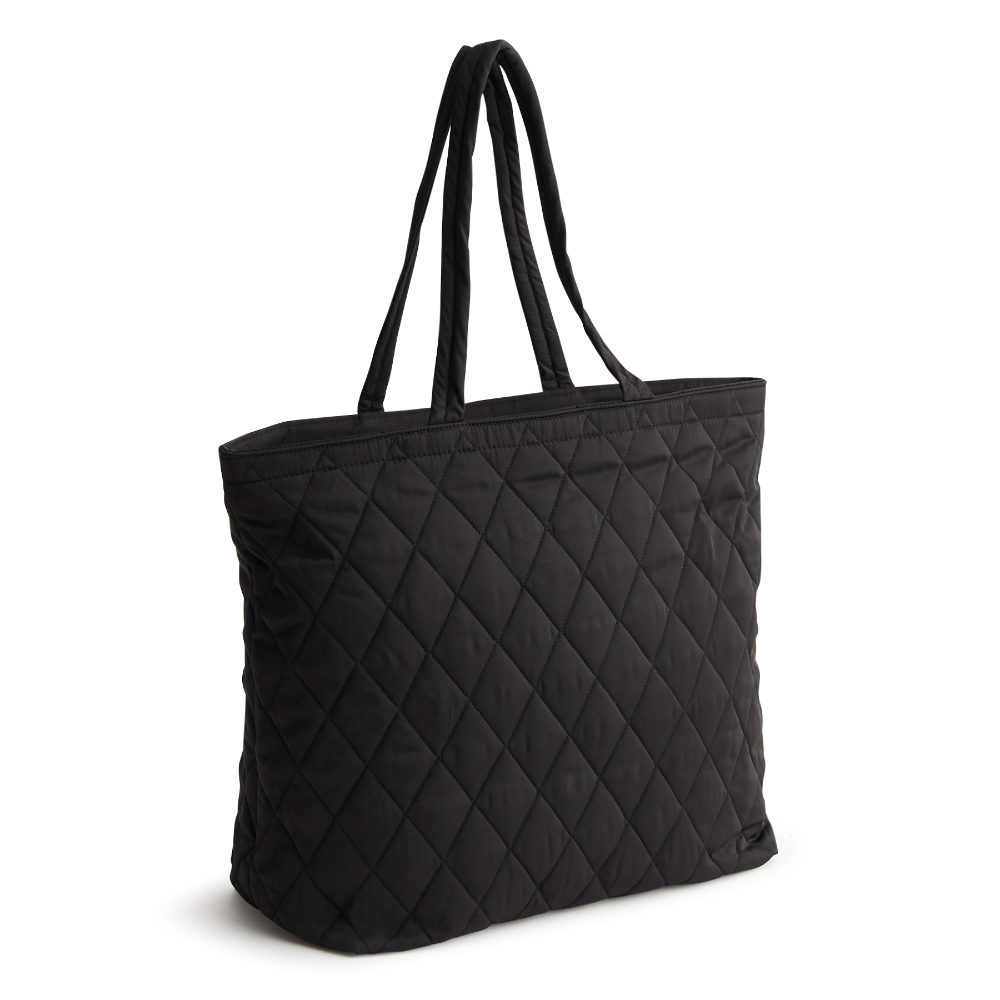 An original tote bag from Vera Bradley, made from polyester twill fabric. Shown in the pattern Moonless Night.