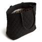 An original tote bag from Vera Bradley, made from polyester twill fabric. Shown in the pattern Moonless Night.
