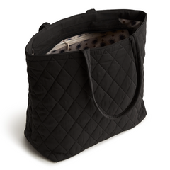 An original tote bag from Vera Bradley, made from polyester twill fabric. Shown in the pattern Moonless Night.