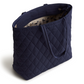 An original tote bag from Vera Bradley, made from polyester twill fabric. Shown in the pattern Peacoat.