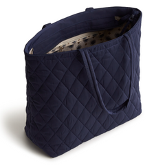 An original tote bag from Vera Bradley, made from polyester twill fabric. Shown in the pattern Peacoat.