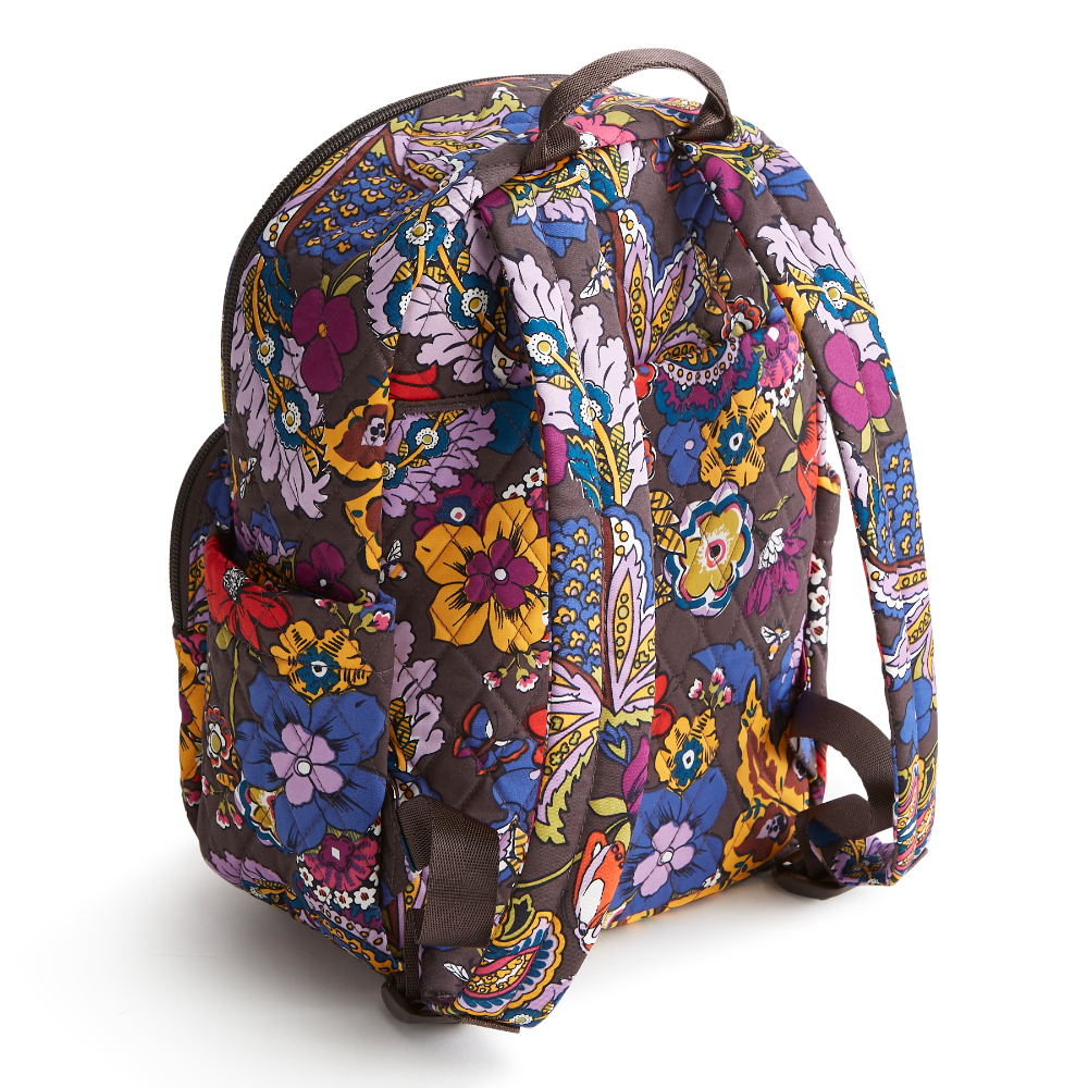 A Vera Bradley small backpack in the pattern Colorful Bouquet.