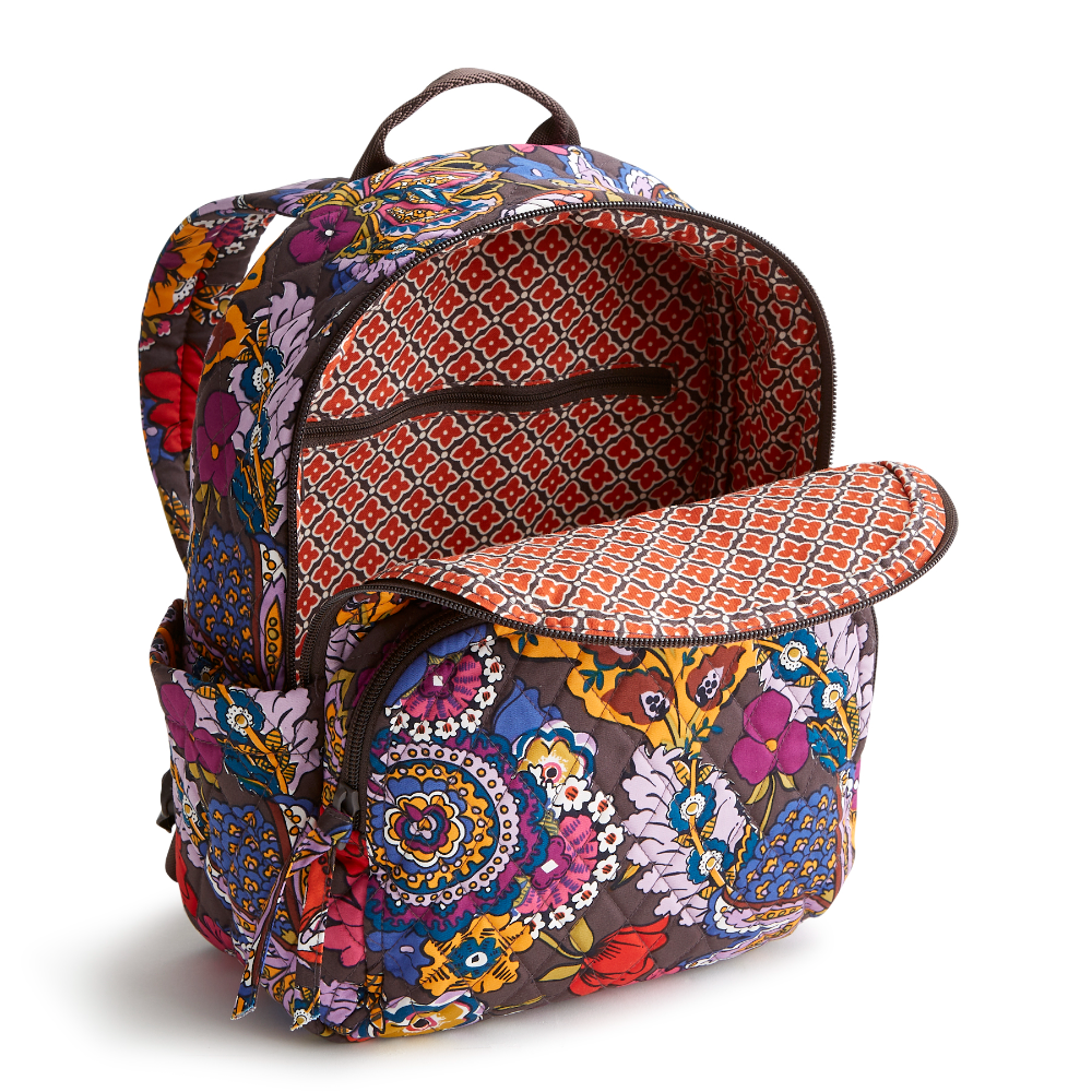 A Vera Bradley small backpack in the pattern Colorful Bouquet.