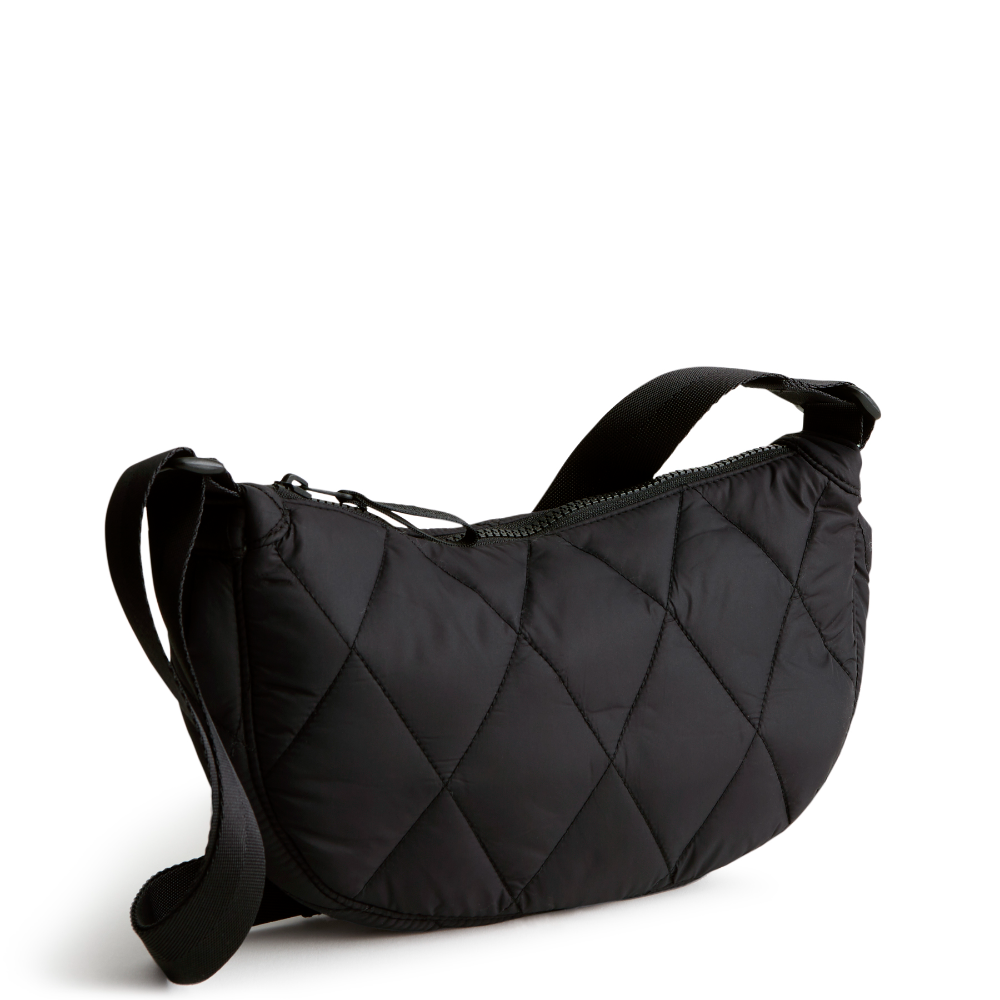 A springbrook sling crossbody bag from Vera Bradley in the pattern Moonless Night.
