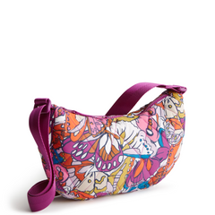 A springbrook sling crossbody bag from Vera Bradley in the pattern Flutter.