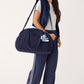 Vera Bradley Weekender Travel Bag in Peacoat, model view