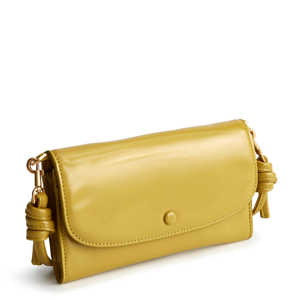 A Vera Bradley Wildwood Wallet Crossbody in Patent Faux Leather. Shown in the color gold.