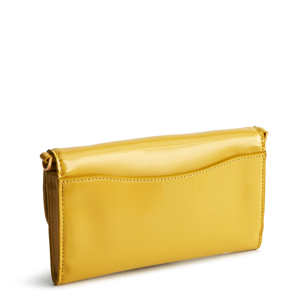 A Vera Bradley Wildwood Wallet Crossbody in Patent Faux Leather. Shown in the color gold.