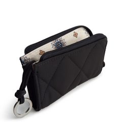 A Vera Bradley Zip Id Case Wallet in Zip Card Pouch in Polyester Twill fabric. Shown in the color black.