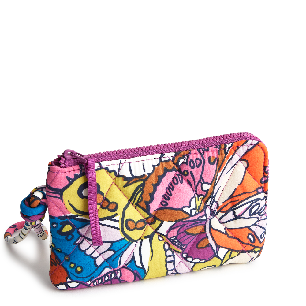 A Vera Bradley Zip Wristlet made from Nylon fabric in the color purple.