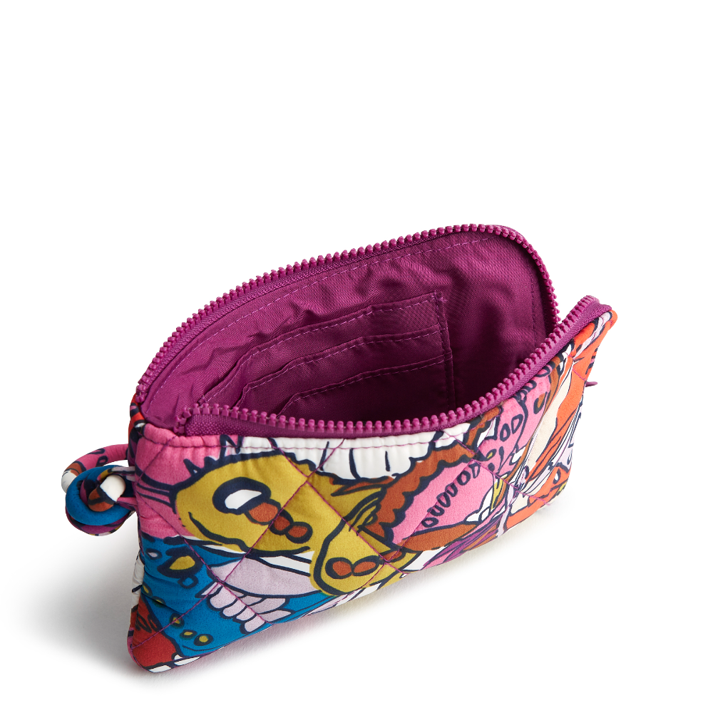 A Vera Bradley Zip Wristlet made from Nylon fabric in the color purple.