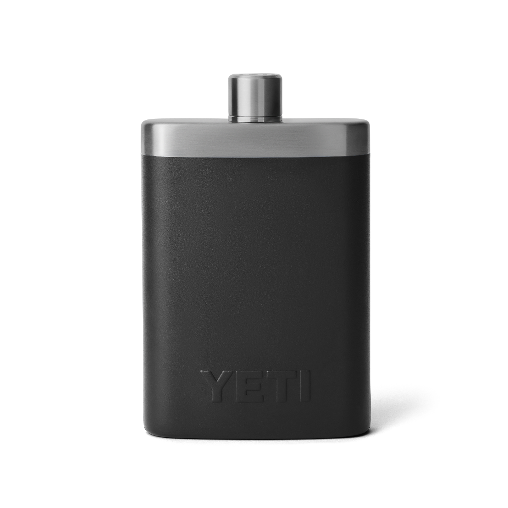 The back view of a black flask with a silver top, and an all black YETI logo.