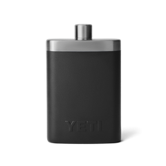 The back view of a black flask with a silver top, and an all black YETI logo.