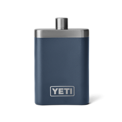 A navy blue flask with a silver top, and silver YETI logo on the front.