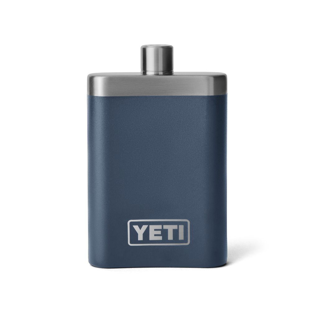 A navy blue flask with a silver top, and silver YETI logo on the front.