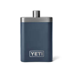 A navy blue flask with a silver top, and silver YETI logo on the front.