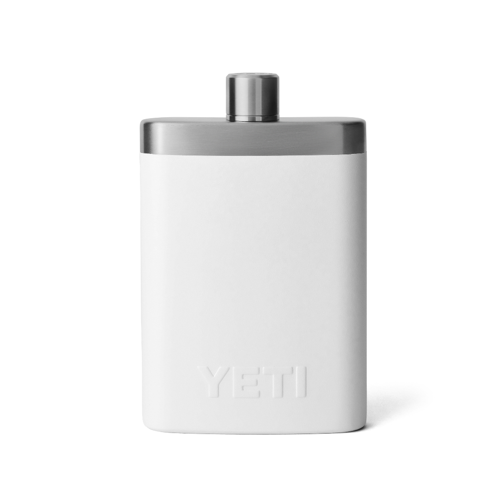 The back side of a white flask, with a silver top, and an all white YETI logo on the back.