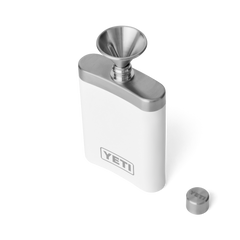 A white flask with a silver funnel on top for easy pouring, with a silver YETI logo on the front of the flask.