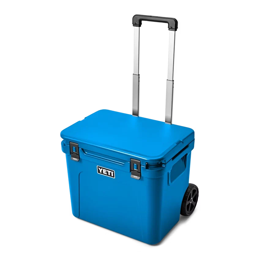 YETI Roadie 60 Hard Wheeled Cooler in Big Wave Blue.