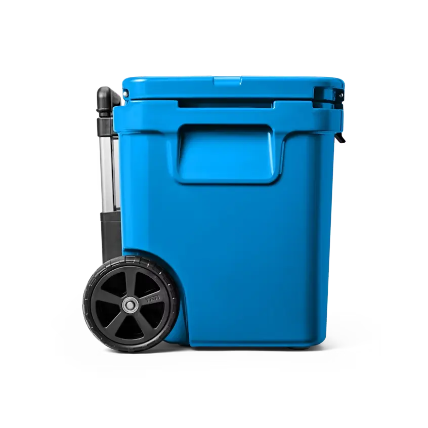 YETI Roadie 60 Hard Wheeled Cooler in Big Wave Blue.