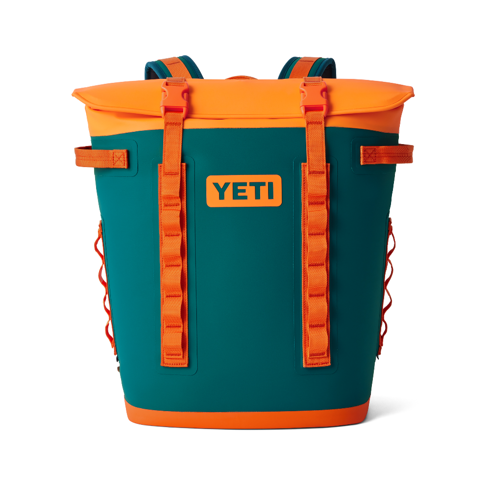The YETI Hopper Backpack M20 Soft Cooler in color Teal and Orange. From YETI Crossover collection.