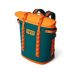 The YETI Hopper Backpack M20 Soft Cooler in color Teal and Orange. From YETI Crossover collection.