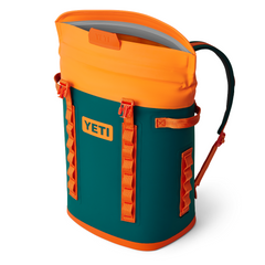 The YETI Hopper Backpack M20 Soft Cooler in color Teal and Orange. From YETI Crossover collection.