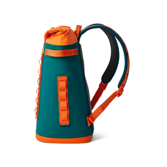 The YETI Hopper Backpack M20 Soft Cooler in color Teal and Orange. From YETI Crossover collection.