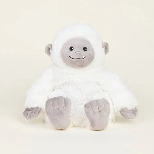 Smiling YETI Warmies stuffed animal.